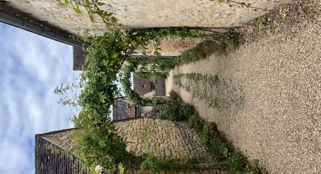 In Périgord Noir, in a pretty little village, a charming character house with a courtyard.