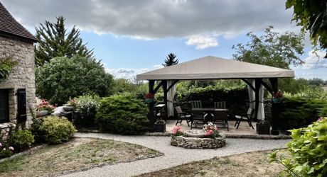 In Périgord Noir, in a pretty little village, a charming character house with a courtyard.