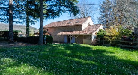 Stunning Renovated Estate with Guest House, Parkland and Pools in the Heart of the Lot Valley