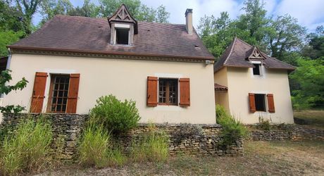 Maison contemporaine, chalets en bois et terrain boisé d'un hectare