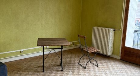 Immeuble de rapport évolutif de 200 m2 habitable avec garages, jardin et potentiel d’aménagement