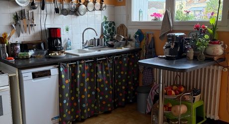 Immeuble de rapport évolutif de 200 m2 habitable avec garages, jardin et potentiel d’aménagement