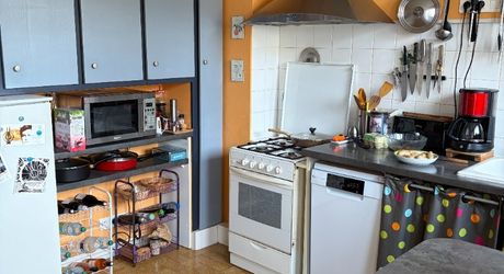 Immeuble de rapport évolutif de 200 m2 habitable avec garages, jardin et potentiel d’aménagement