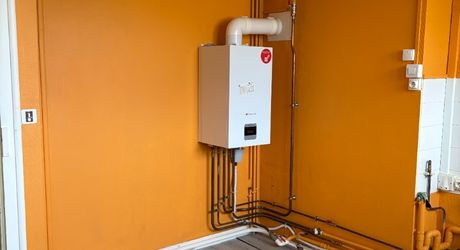 Immeuble de rapport évolutif de 200 m2 habitable avec garages, jardin et potentiel d’aménagement