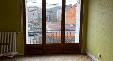 Immeuble de rapport évolutif de 200 m2 habitable avec garages, jardin et potentiel d’aménagement