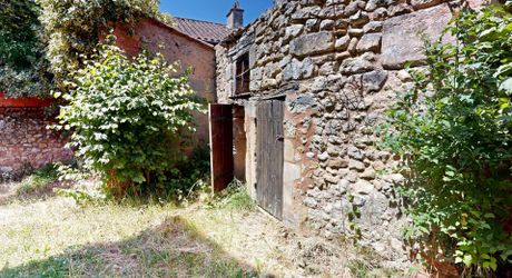 Elégante maison de village en pierre avec jardin et vue !