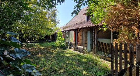 Perigordian stone house to renovate with outbuildings and land of approx. 5000m2