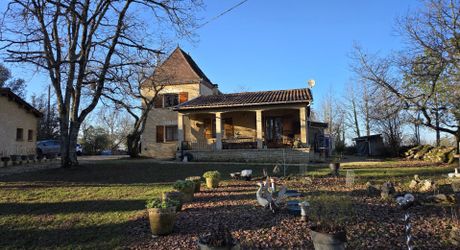 Contemporary house with guest cottage and beautiful grounds in a peaceful location !