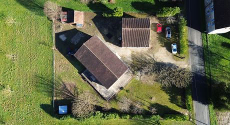 Maison de plain-pied avec 4 chambres, garages et dépendance camping-car