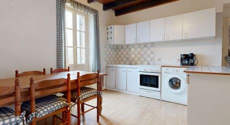 Ensemble immobilier de deux maisons mitoyennes avec terrasses