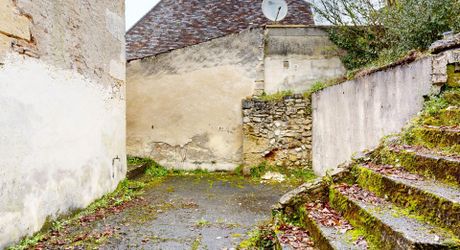 Ensemble immobilier de deux maisons mitoyennes avec terrasses