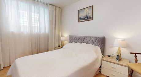 Appartement T3 de standing en rez-de-jardin avec  petit jardinet et place de parking sécurisée 