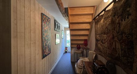 Propriété de charme , traversé par un ruisseau, avec activité gîte et chambres d'hôte, au coeur d'un village avec tous commerces