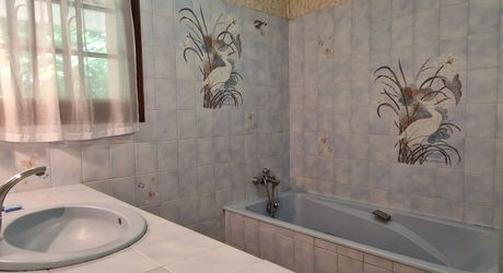 Maison de Plain pied et jardin proche des commerces.
