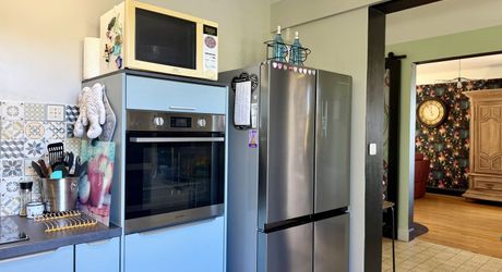 Maison en pierre rénovée avec jardin, appartement indépendant et garage – Commerces à pied