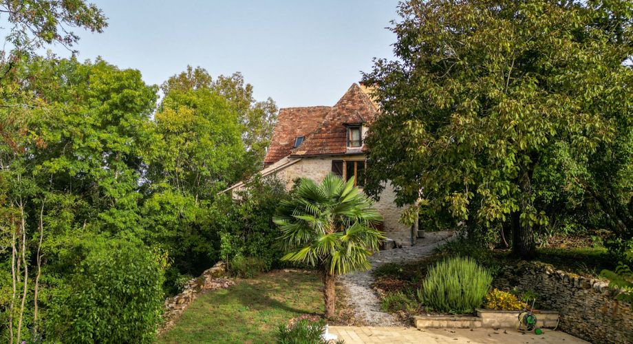 EXCLUSIVITE - Secteur GOURDON - Maison en pierre atypique, four à pains, piscine sur 3455 m² boisés