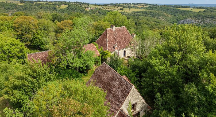 SECTEUR GOURDON - Charme et authenticité pour cet Ensemble en pierre sur 2ha60 avec vue panoramique