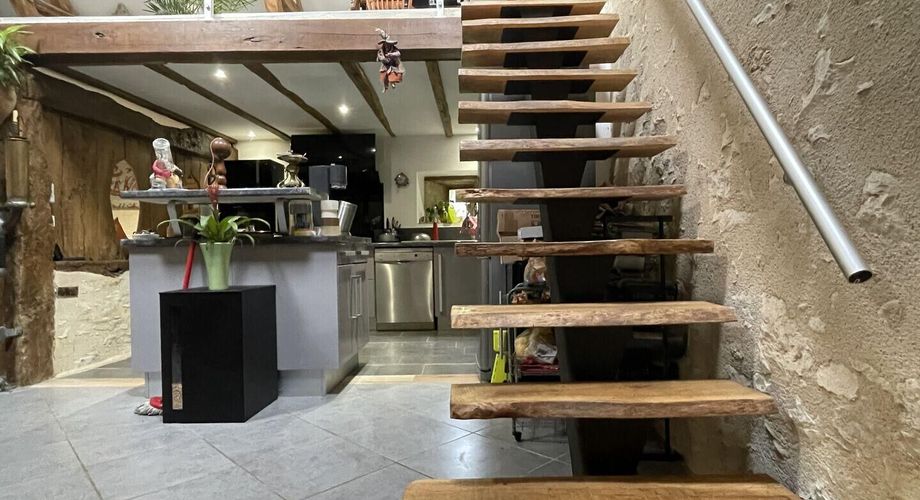  Une grange de caractère rénovée, non loin d'un cours d'eau