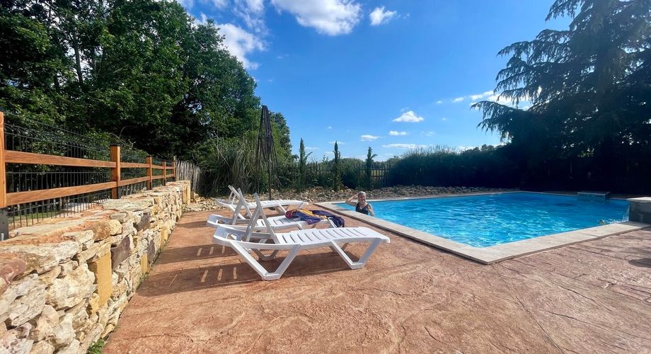 Property with two cottages, a main house, and two swimming pools